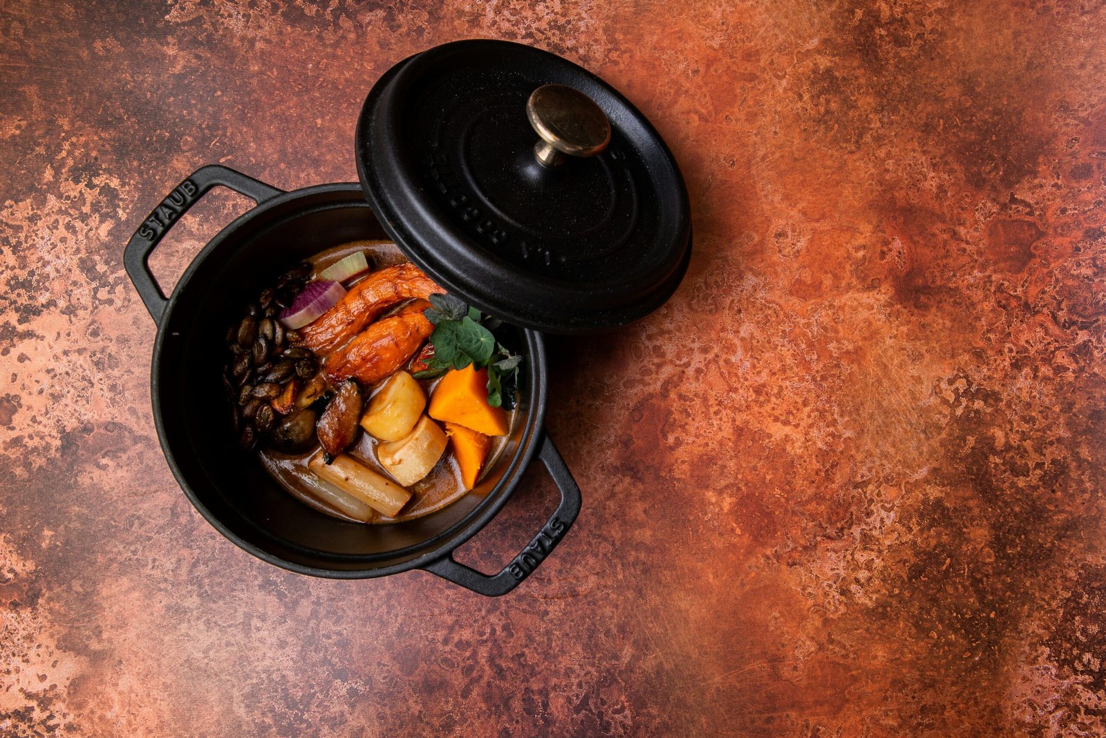 black cooking pan with black cooking pan with food
